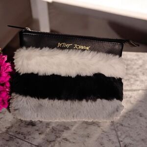 Betsey Johnson Tri Color faux fur wristlet featuring a black leather top